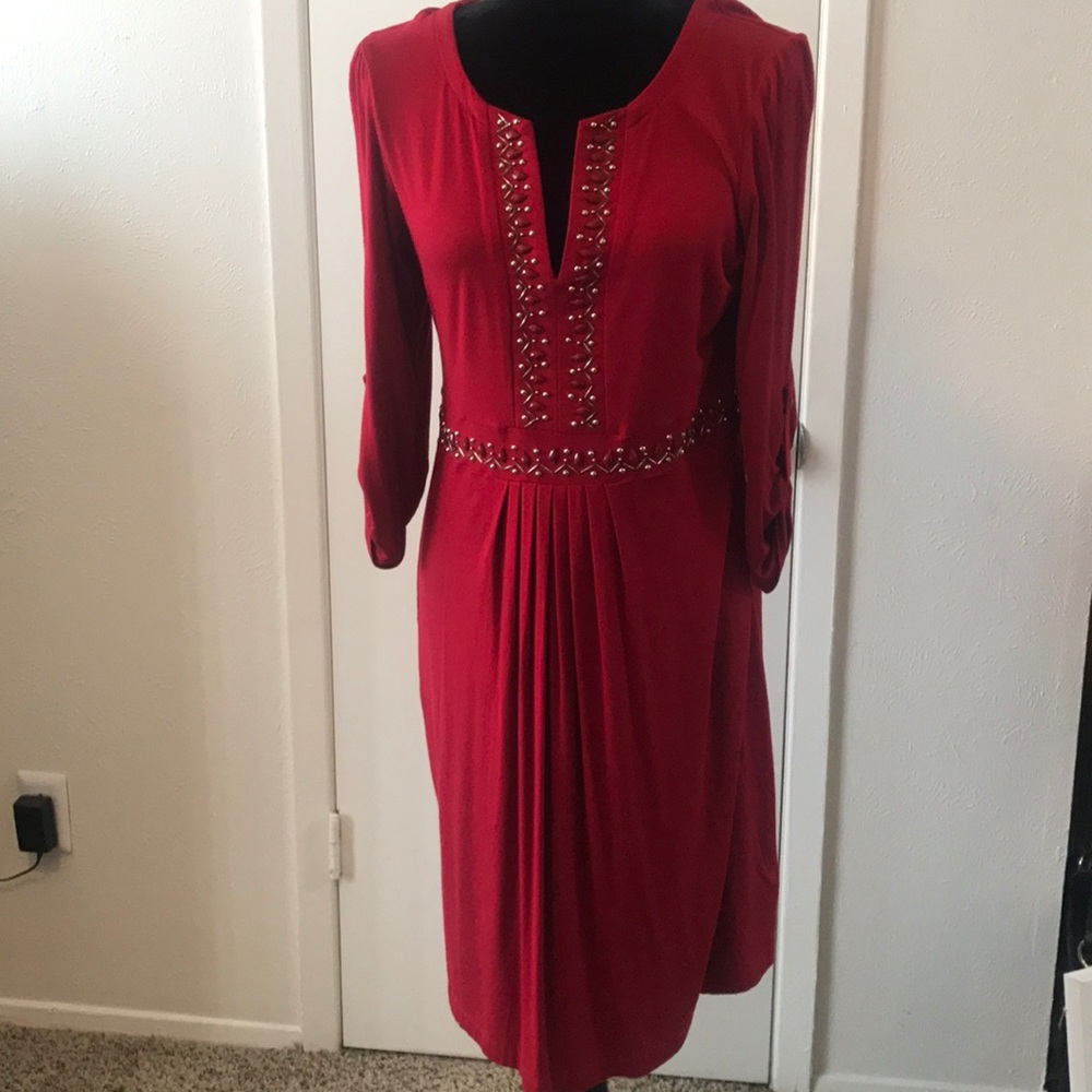 Beautiful beaded red dress, v- neck line.